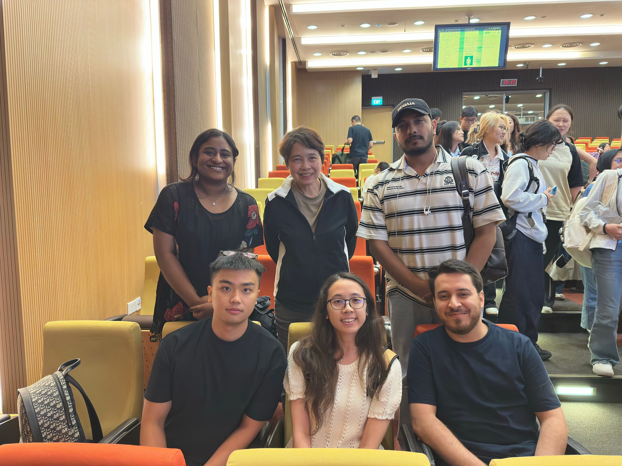 Jerlyn with fellow MScPHM students at a programme session