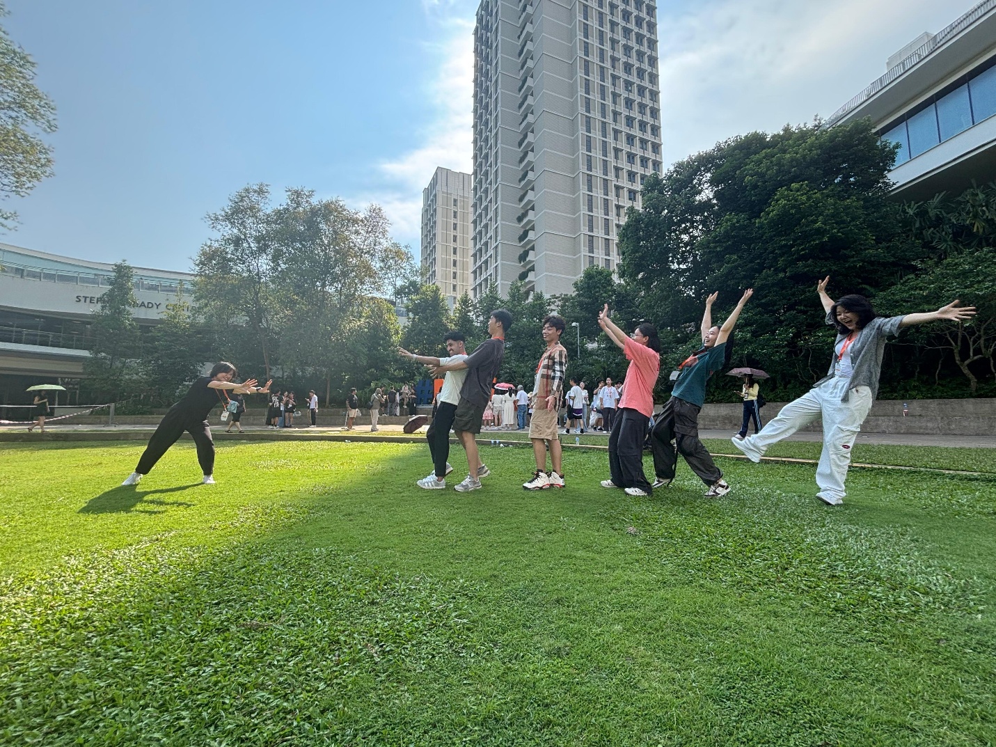 Sheng Jie taking part in a cohort activity with fellow MScPHM students on campus