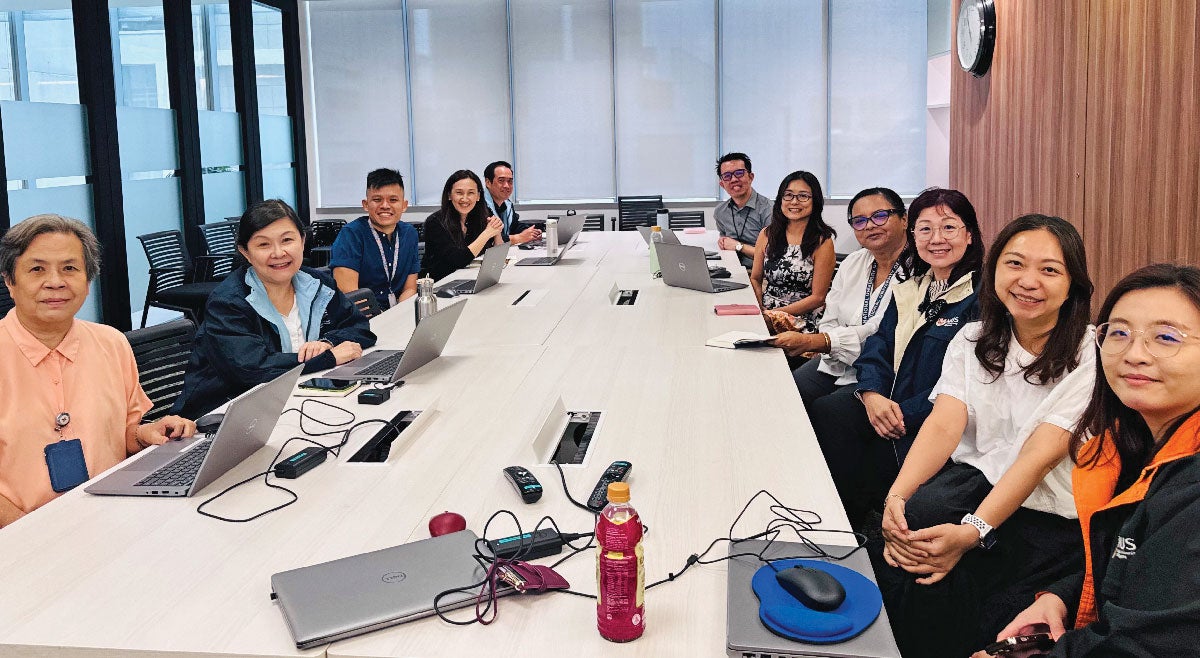 Vincent (third from left) and Dr Zhou (fourth from left) at the successful conclusion of the Pre-Board of Examiner Briefing.