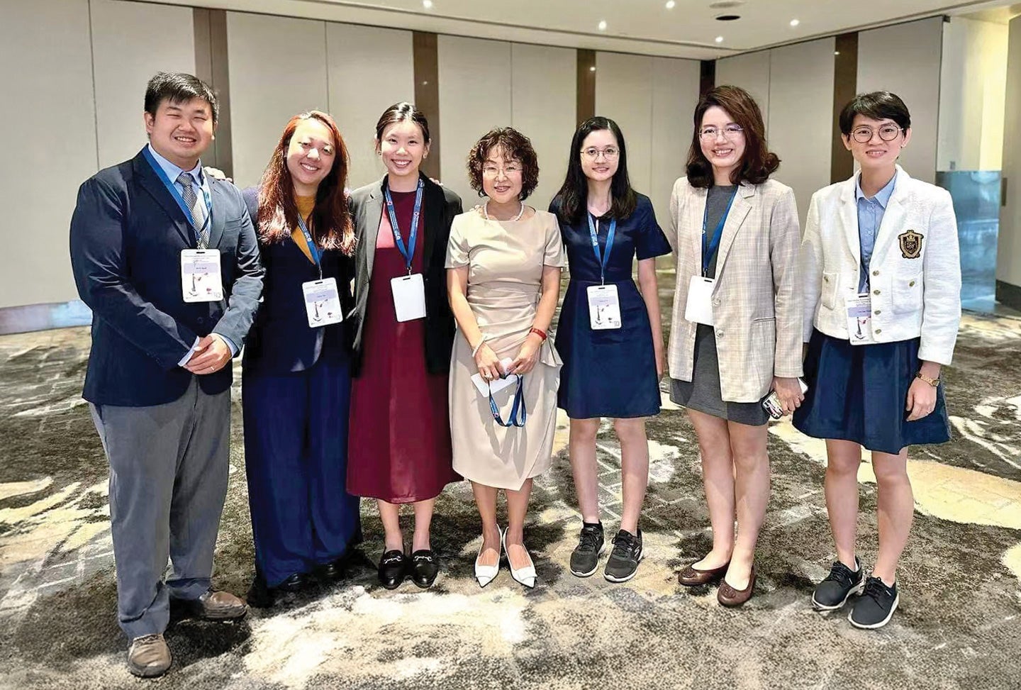 Prof Wang (centre) and her PhD students, including Dr Jiang Ying (second from right).