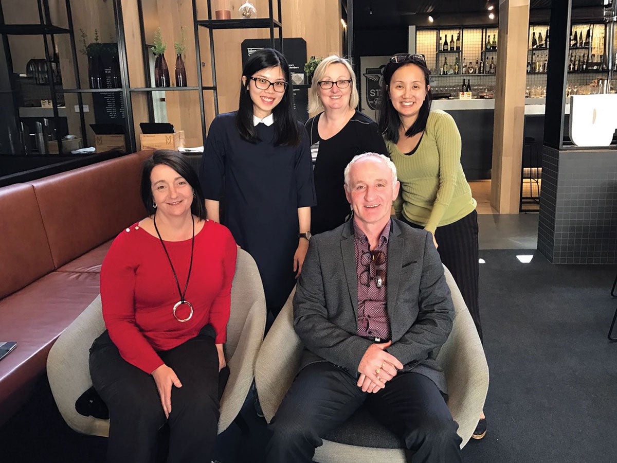 Prof Liaw (back row, first from right) and Dr Chua (back row, first from left) with international collaborators.