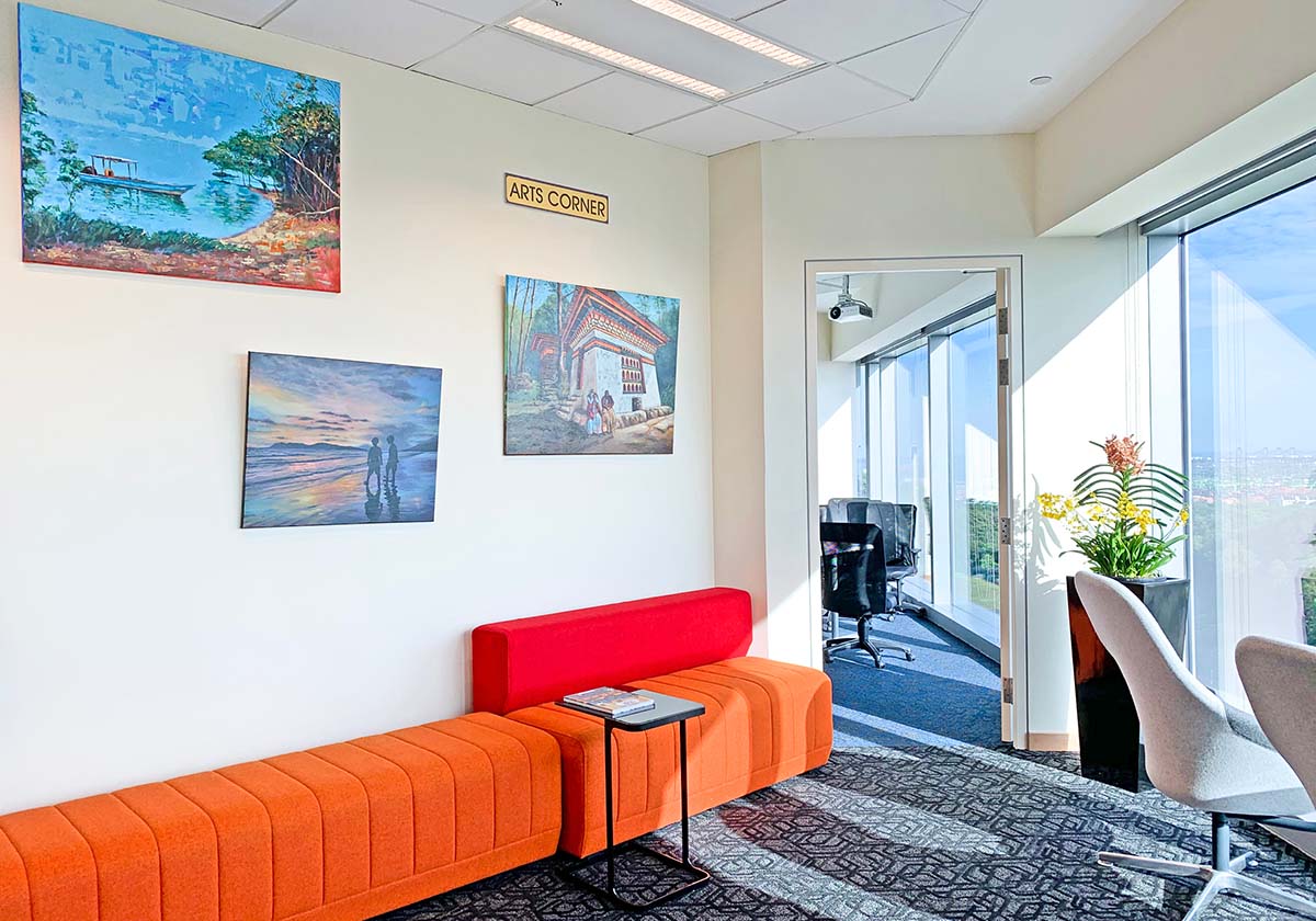 Photo of some of Chin Kiat’s paintings on display at lounge area in Dean’s Office, Level 11, NUHS Tower Block