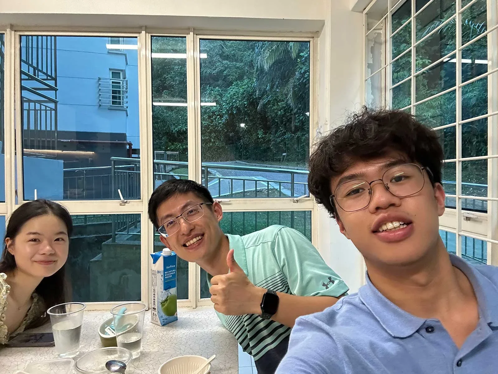 Hongpeng (middle) celebrating the Lantern Festival with his nightly running and badminton mates.