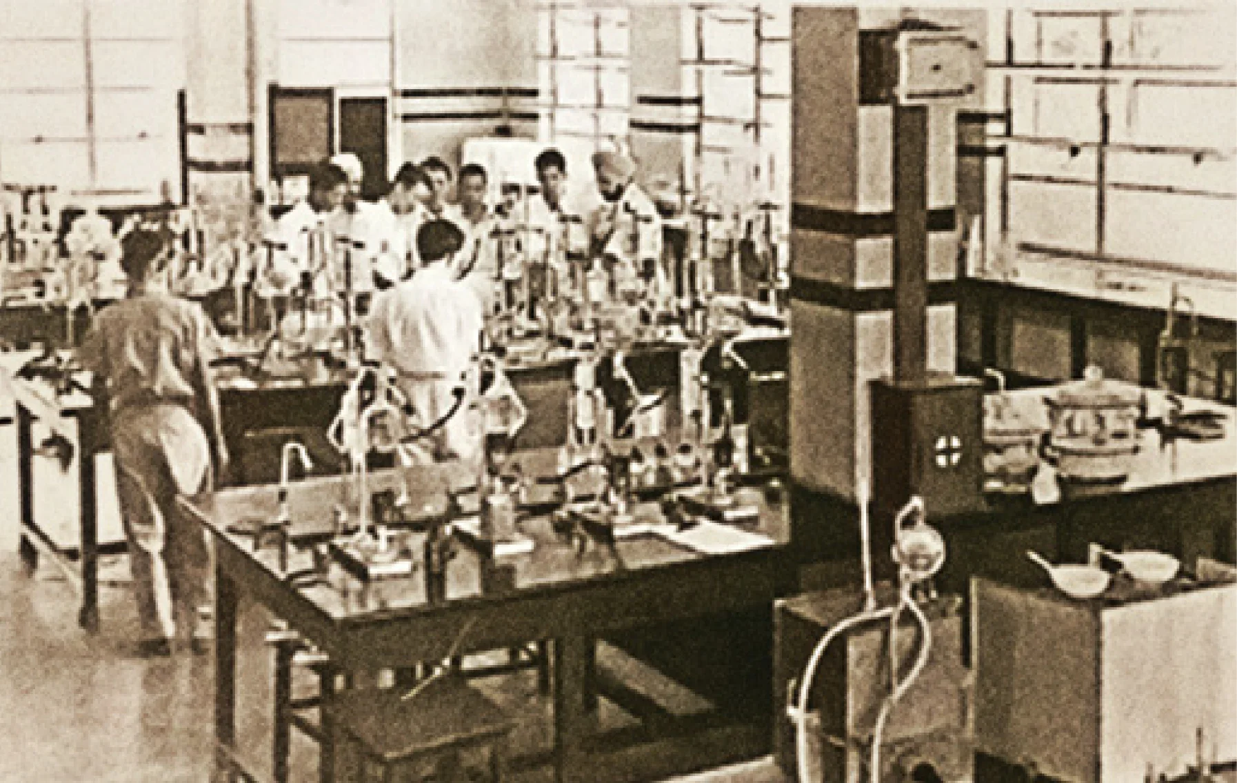 Monochromatic photo. Analysing work in progress in a lab.