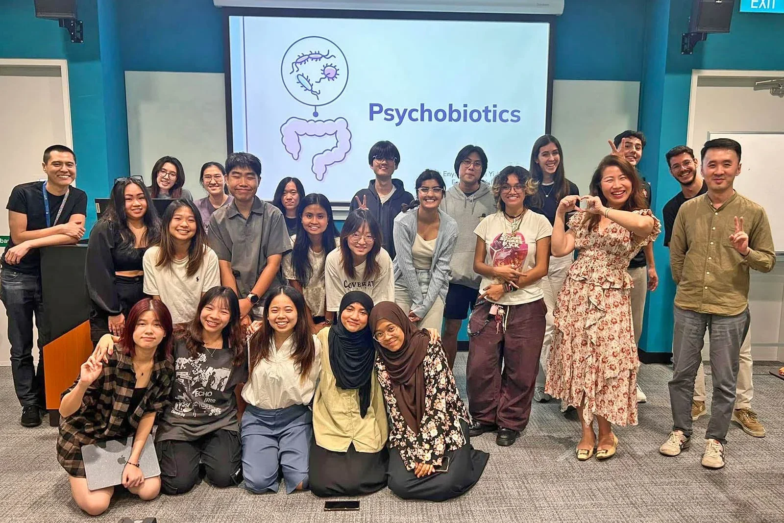 Various people at a presentation named Psychobiotics.
