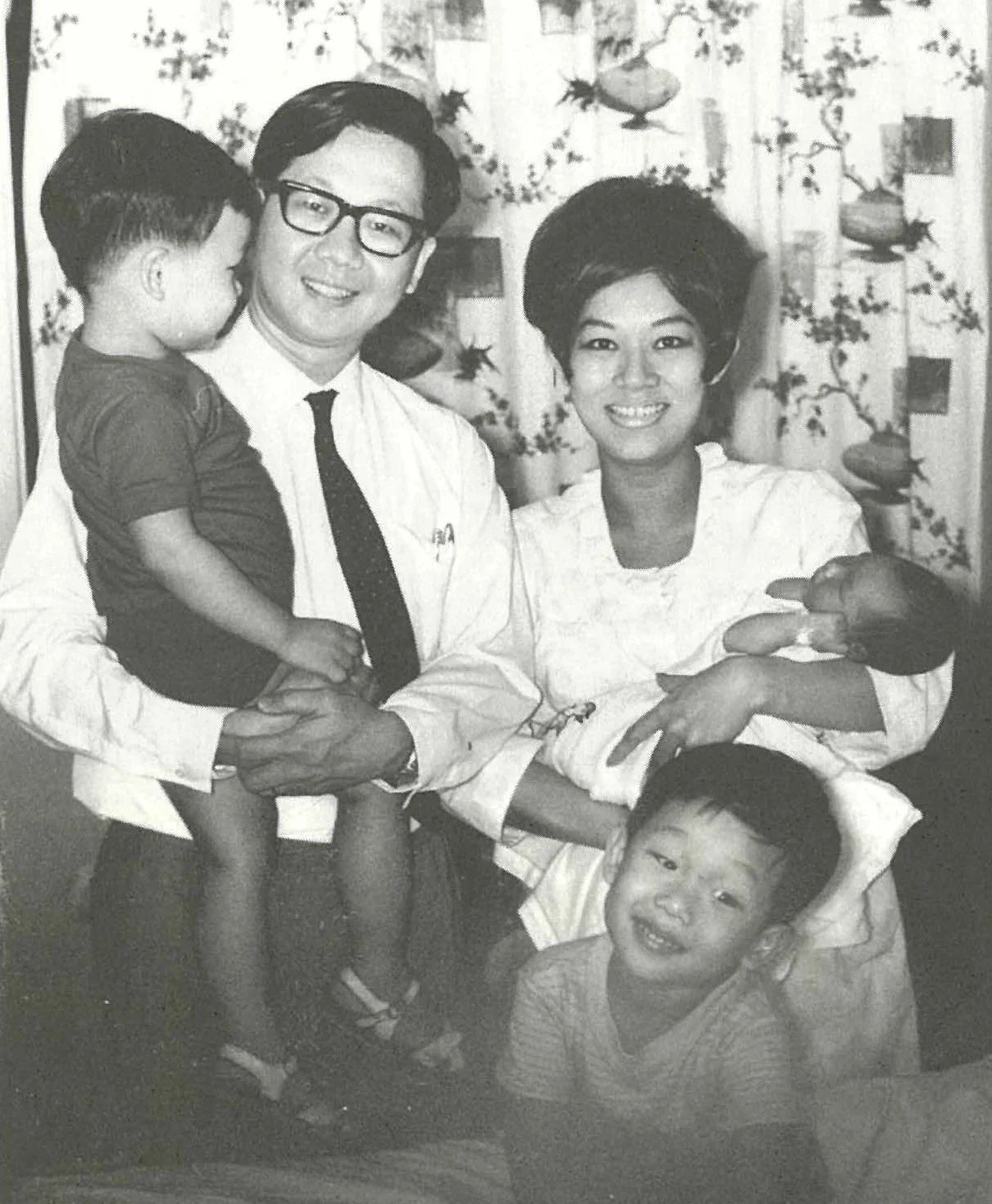 Old monochromatic photo of Prof Lim and his family in 1966 in his younger days.