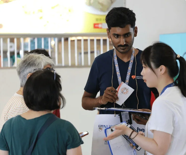 Various NUS staff and elderly people.